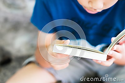 Closeup Child Reading Book Stock Photo