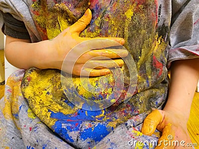 Closeup of children hands painting during a school activity - learning by doing, education and art, art therapy concept Stock Photo