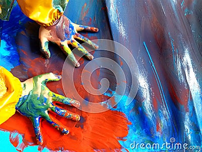 Closeup of children hands painting during a school activity - learning by doing, education and art, art therapy concept Stock Photo