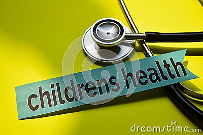 Closeup children health with stethoscope concept inspiration on yellow background Stock Photo