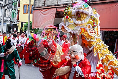 Closeup Chinese lion dancer and the old man performance in Chinese respect the gods Editorial Stock Photo