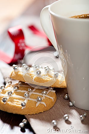 Closeup of christmas biscuits and a mug of coffee Stock Photo