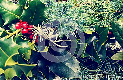 Closeup of Christmas crowns composition. Top view of pine and bay tree branches - Vintage retro Christmas concept Stock Photo