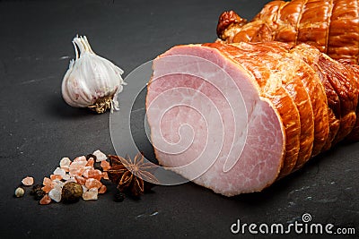 closeup chunk of smoked gammon with salt, spices and garlic Stock Photo