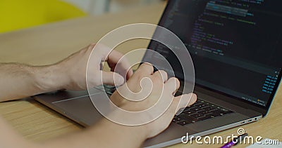 Closeup coding on screen, Man hands coding html and programming on screen laptop, development web, developer. Stock Photo