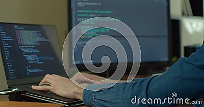 Closeup coding on screen, Man hands coding html and programming on screen Monitors, development web, developer. Stock Photo