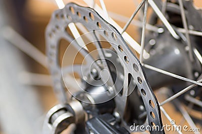 Closeup cogwheel attached to bicycle wheel, mechanical repair concept Stock Photo