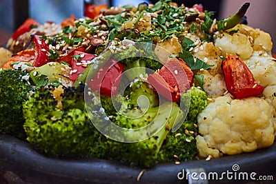 Closeup of colorful grilled vegetables in a cast iron kettle. Stock Photo