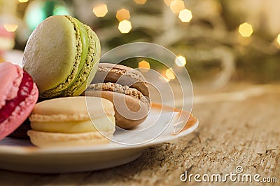 Closeup of colorful tasty macaroons in plate Stock Photo