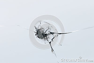 Closeup of cracked windshield with fissure lines, abstract background with copy space Stock Photo