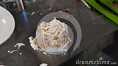 Closeup of a cream brule. Burning cream burner. Cream on the cake Stock Photo