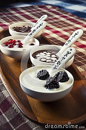 Closeup cream dessert with chocolate and berries i Stock Photo