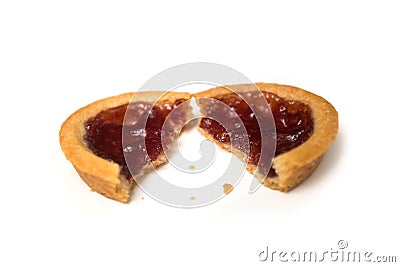 crunched mini tartlet with strawberry jam on top view on white background Stock Photo