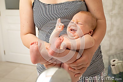 Gentle respond to baby`s natural hygiene needs Stock Photo