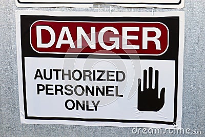 Closeup of a Danger Authorized Personnel Only Sign Stock Photo