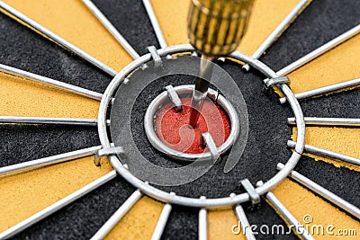 Closeup dart target with arrow on bullseye Stock Photo