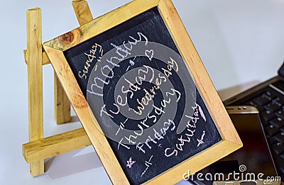 Closeup Days of Week. Weekly Calendar on chalkboard background. 7 day plan Stock Photo