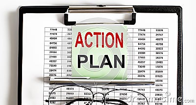 Closeup of the deadline time of ACTION PLAN and glasses and pen Stock Photo