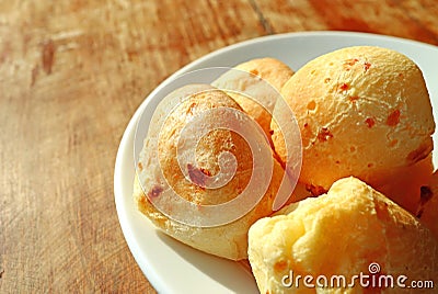 Closeup Delicious Pao de Queijo, Traditional Brazilian Cheese Breads Served on Wooden Table Stock Photo