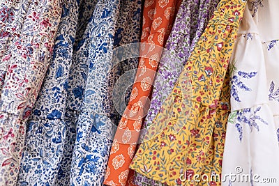 Closeup detail floral pattern woman dresses in shop Stock Photo