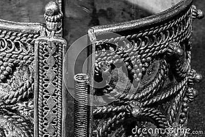 Closeup detail of silver bracelet with stripes and balls Stock Photo