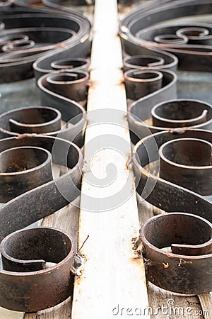 Closeup Details of a Black Wrought Iron Fence Stock Photo