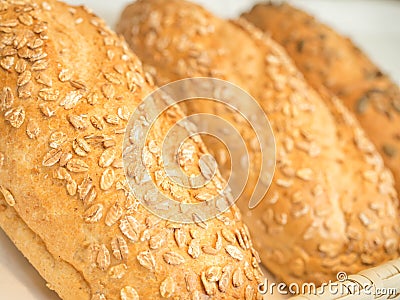 Closeup details of fresh baked Avena Vital Bread with oat flakes Stock Photo