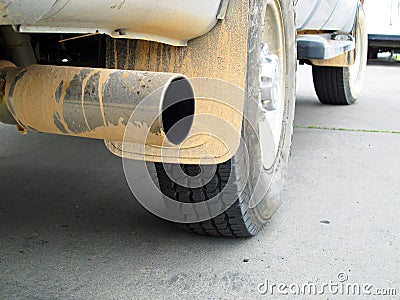 Closeup of Dirty Pickup Truck After Playing in the Red Mud Stock Photo