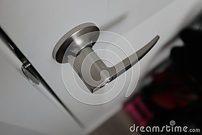 Closeup of door handle -- stainless steel material Stock Photo