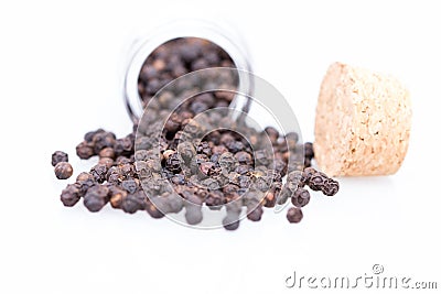 Closeup dried black pepper on white background Stock Photo