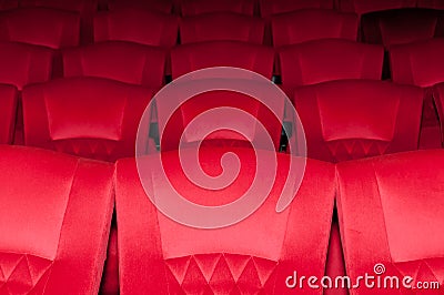 Closeup empty seat on row in thearter Stock Photo