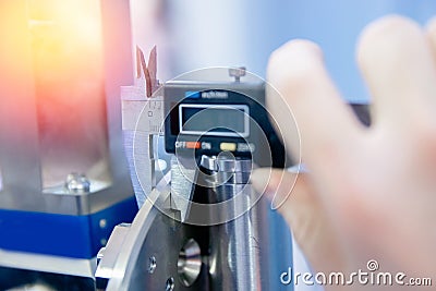 Closeup Engineer checks quality of detail for engine at car manufacturing plant, industry concept Stock Photo