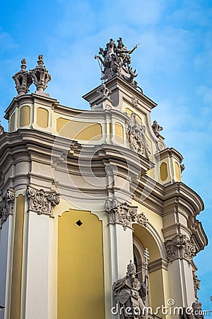 closeup facade of church of St. Jura with different large sculptures against blue sky Stock Photo