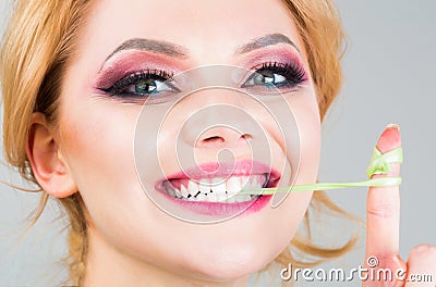 Closeup face, smile. Woman makeup, bubblegum, gum.Bubble chewing girl, bubble gum portrait. Fun female and happy. Makeup Stock Photo