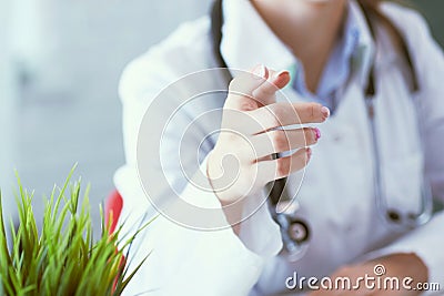Closeup female health care professional, woman doctor pointing finger, you did something wrong. Stock Photo