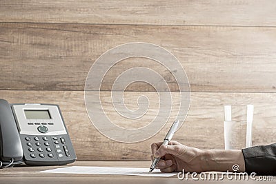 Closeup of female lawyer or executive signing a contract Stock Photo