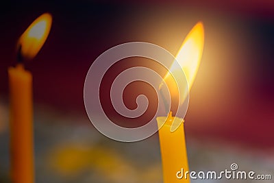 Closeup fire at candle burning in Thailand Temple Stock Photo