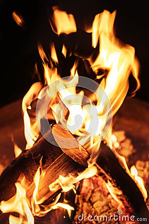Closeup of fire flames, campfire or burning wood stove, black ba Stock Photo