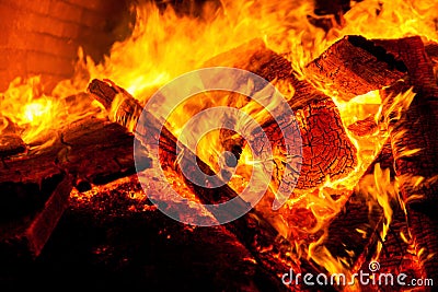 Closeup fire of an oven of wood - orange Stock Photo