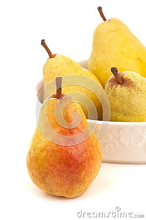 Closeup of Four Pears on White with Copy Space Stock Photo