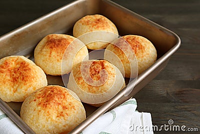 Fresh Baked Homemade Brazilian Cheese Bread or Pao de Queijo in the Baking Tray Stock Photo