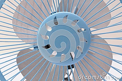 The closeup front view of a universal serial bus powered blue portable table fan Stock Photo