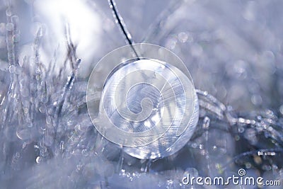 Closeup of a frozen crystal ball in an icy environment Stock Photo