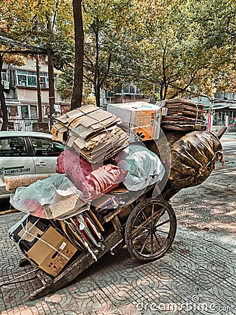 garbage collection in the street of Wuhan city Editorial Stock Photo