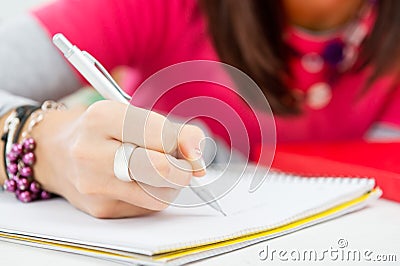 Closeup Of Girl Hand Writing Stock Photo