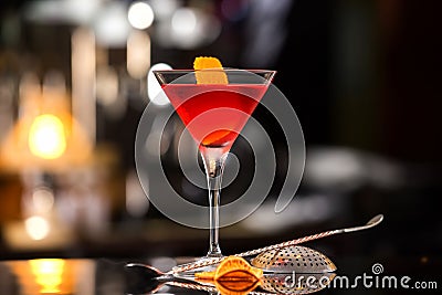 Closeup glass of Manhattan cocktail decorated with orange Stock Photo