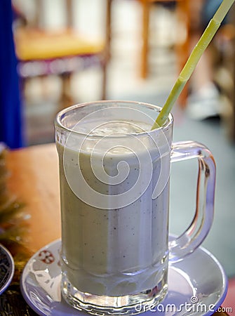 Closeup of a glass of Moroccan avocado milk drink Stock Photo