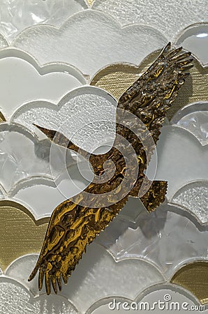 Golden glass swan flying Editorial Stock Photo