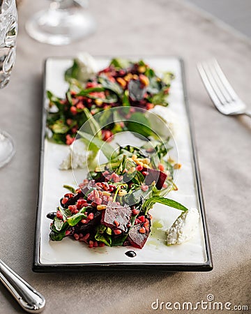 Closeup gourmet appetizer beet salad with cheese Stock Photo