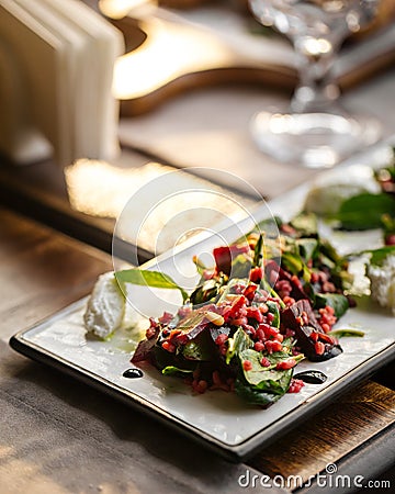Closeup gourmet appetizer beet salad with cheese Stock Photo